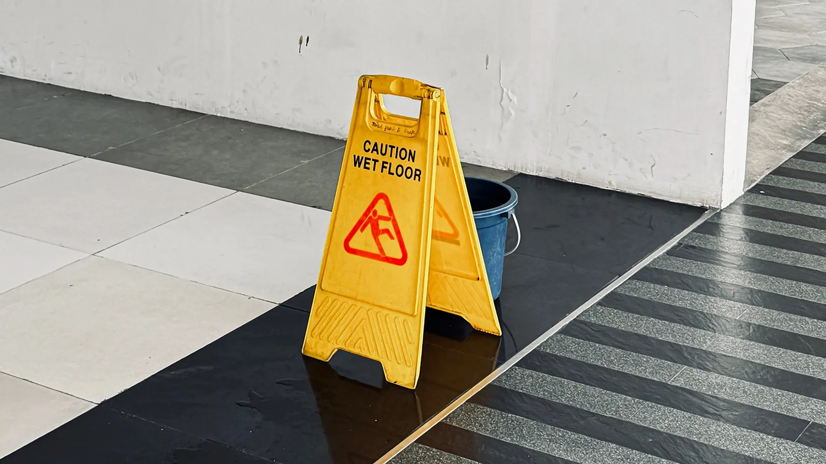 Caution wet floor sign on a staircase